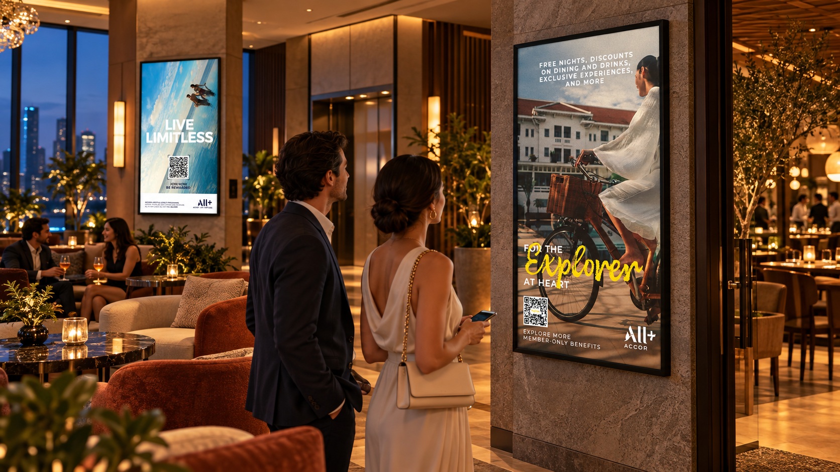 Elegant hotel lounge at dusk with digital displays featuring Accor membership offers